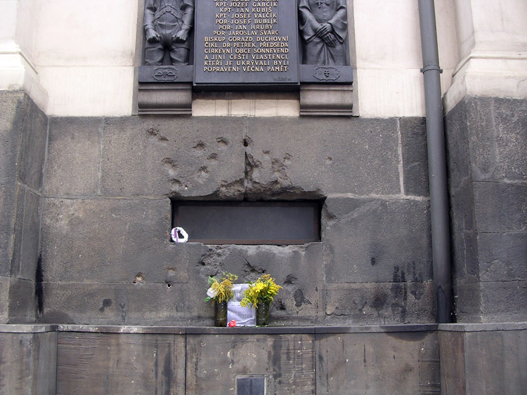 Bullet-scarred window of the Saints Cyril and Methodius Cathedral in Prague where the attackers were cornered. Source: Wikipedia
